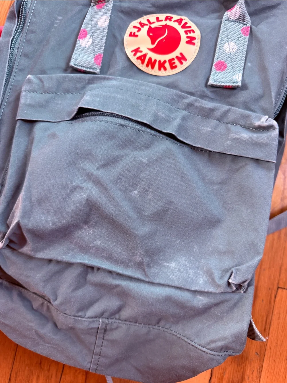 Fjallraven gray and pink polka dot backpack